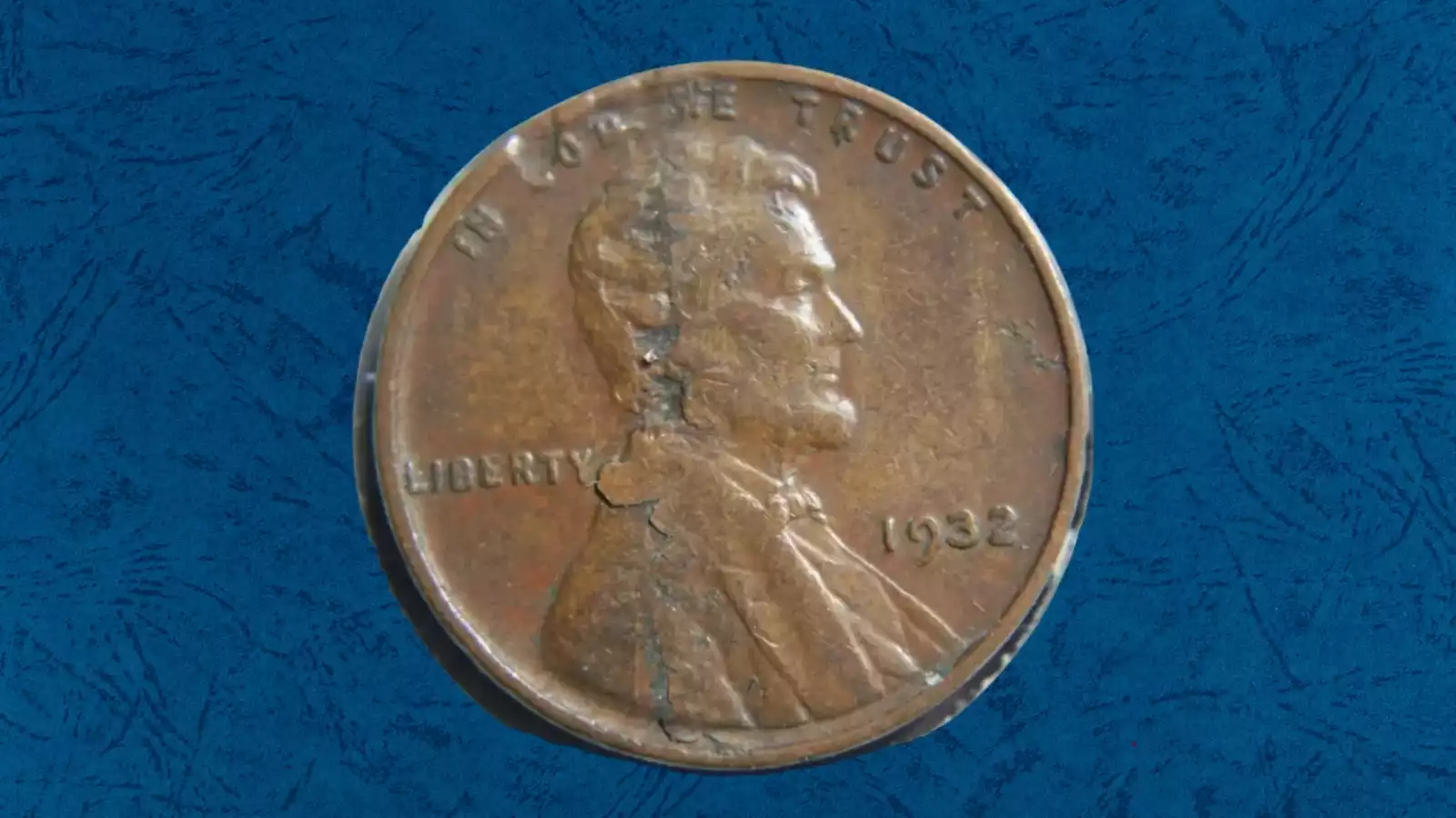 1932 wheat penny lamination error showing metal flaking and peeling from the copper coin surface