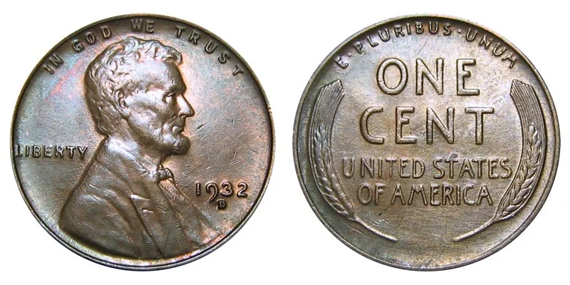 Grading strip showing four 1932 wheat pennies from worn Good grade through Extremely Fine to Mint State uncirculated condition